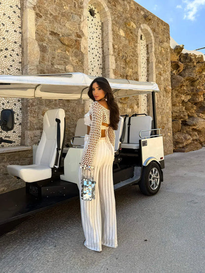 Conjunto Aurora Tricô Artesanal com Top Vazado e Calça Flare Leve